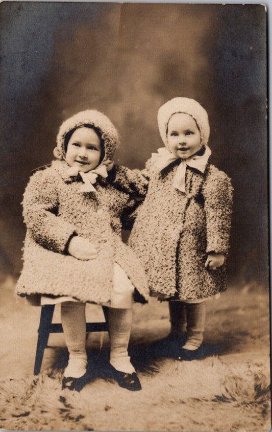 Real Photo Postcard Two Little Girls in a Photo Studio Ella Seymour