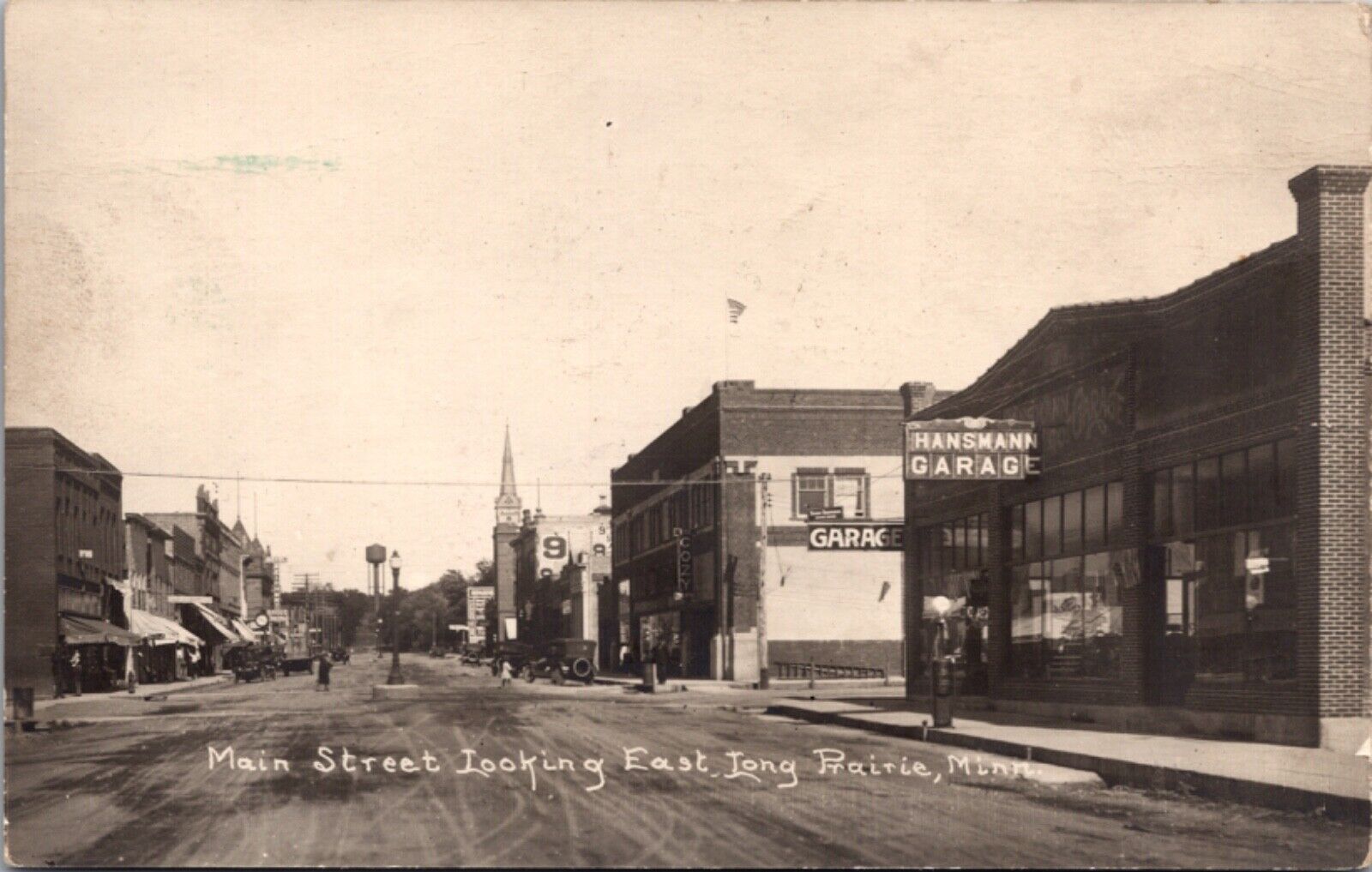 RPPC Main Street, Looking East, Long Prairie, Minnesota Automotive Garage