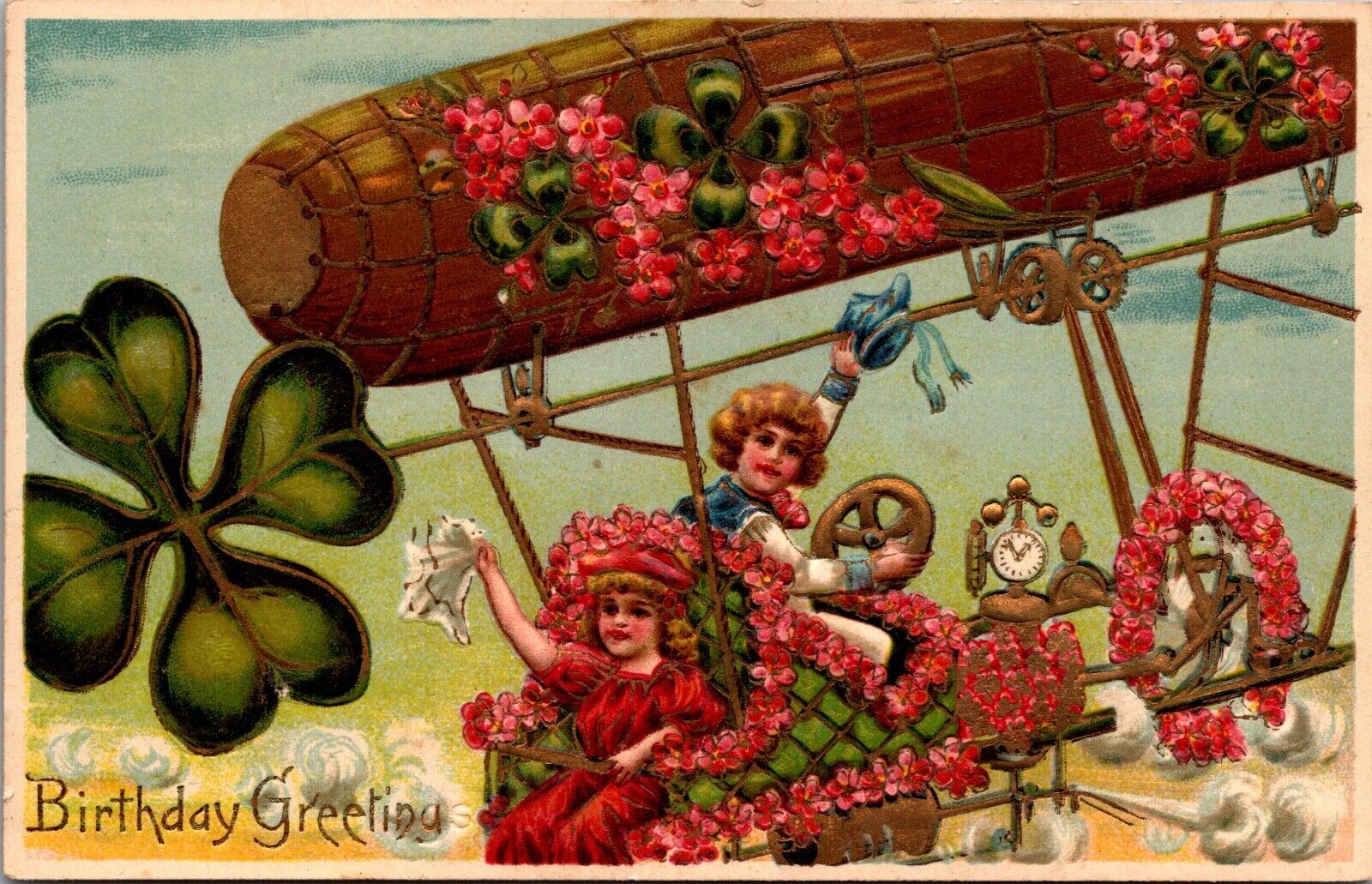 Birthday Greetings PC Children Flying Zeppelin Four Leaf Clover Pink Flowers