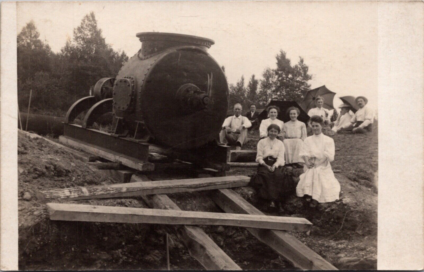 RPPC John Dearborn and People Sitting Next to Turbine for Mill in Newburgh Maine