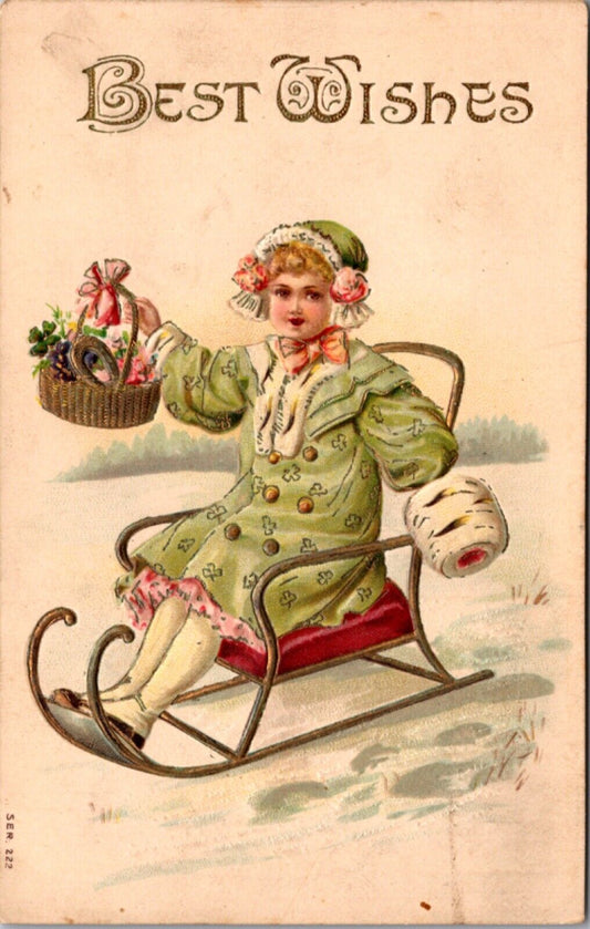 Best Wishes Postcard Young Girl Sitting in Sled with Basket of Flowers Horseshoe