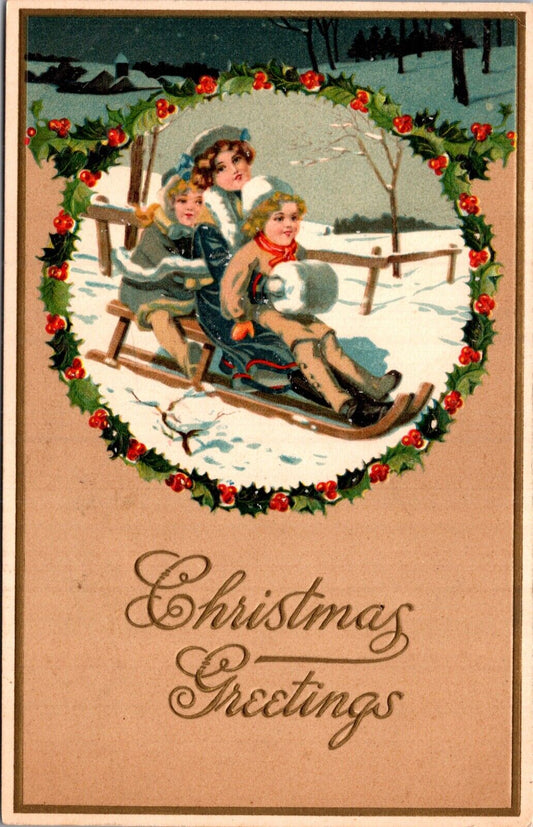 Christmas Postcard Three Children Sledding Down Snowy Hill