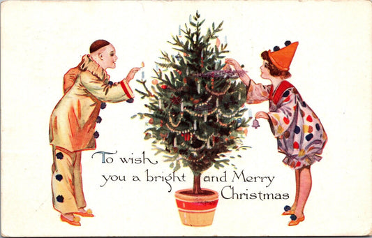 Christmas Postcard Man and Woman Pierrot Clown Decorating a Tree