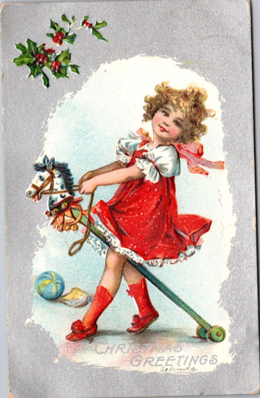 Christmas Postcard Little Girl on Hobby Horse Stick Toys Playing Ball Book