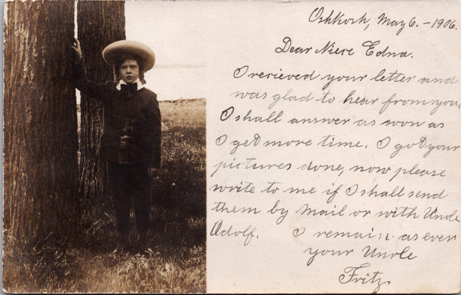 Real Photo Postcard Young Boy Standing with Tree in Oshkosh, Wisconsin