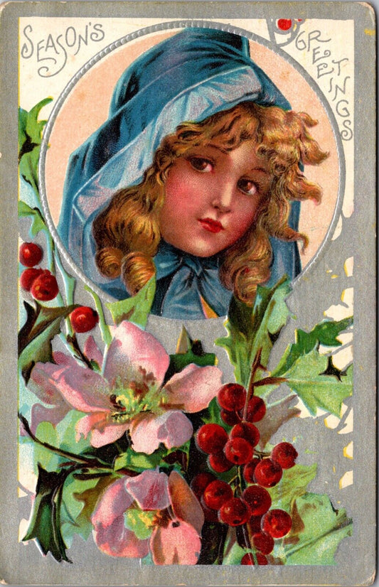 Christmas Postcard Blond Girl Wearing Blue Hood, Flowers and Holly Silver Border