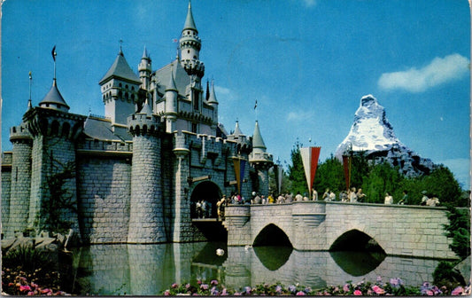 Disneyland Postcard Sleeping Beauty's Enchanted Castle and Matterhorn Mountain