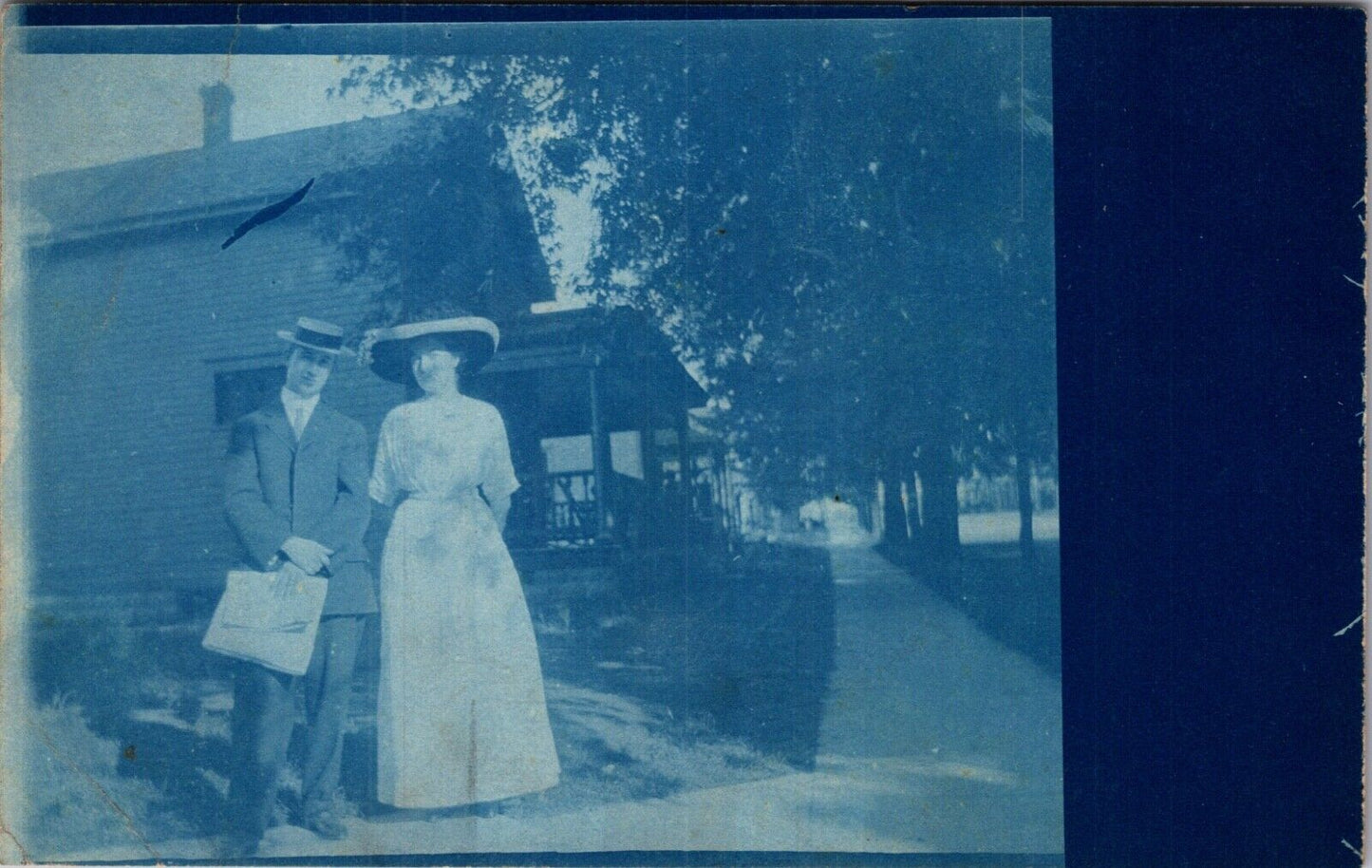 Cyanotype Real Photo Postcard Two Well Dressed People Outside of a House