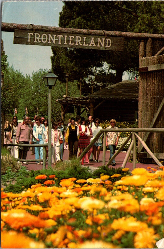 Disneyland Postcard 1970s Entrance to Frontierland Log Stockade Flowers