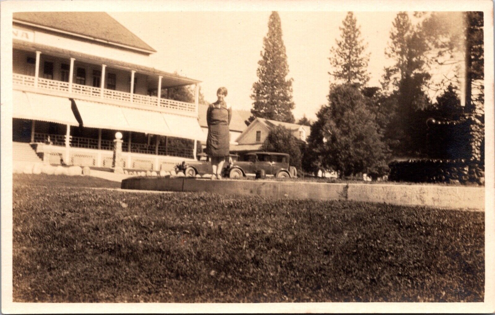 Real Photo Postcard Woman Outside of Winona Lodge Hotel in Yosemite, California