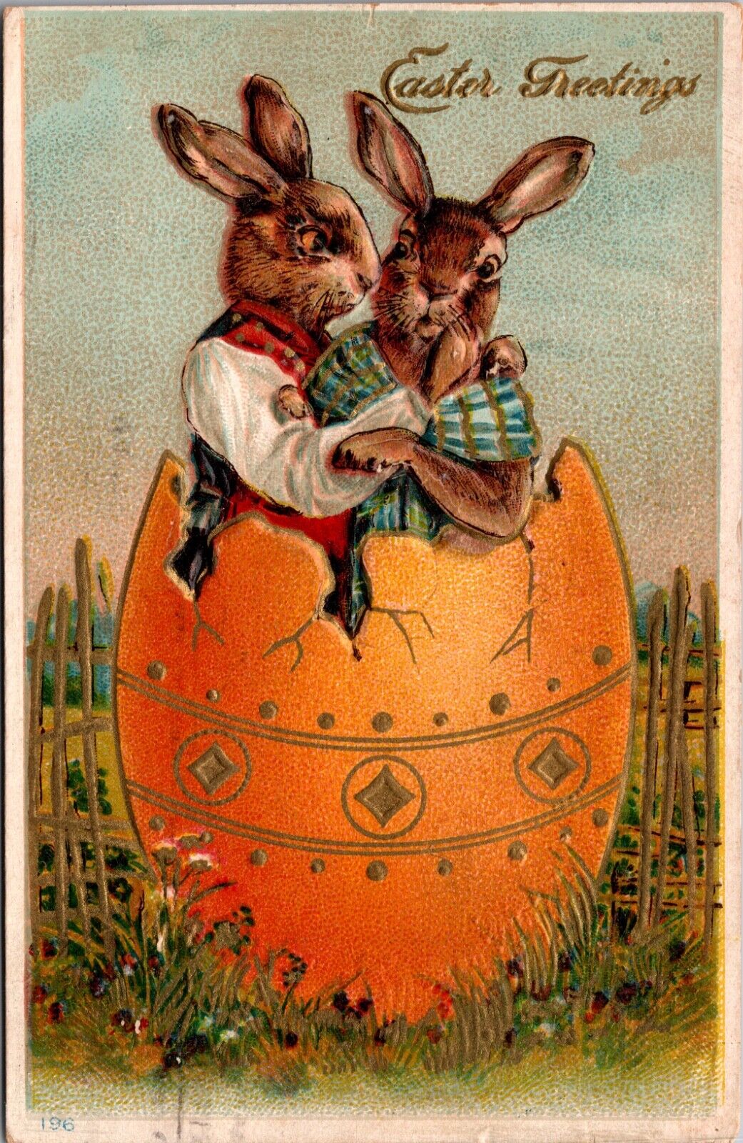 Easter Postcard Two Dressed Bunny Rabbits Standing in Yellow Colored Eggshell